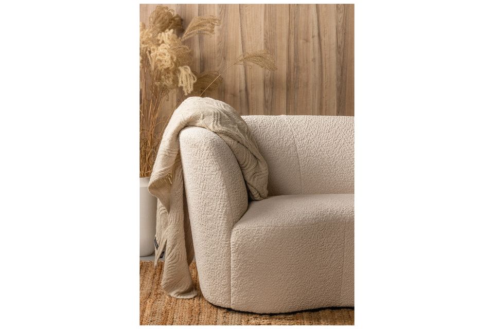 Il divano angolare sinistro Stone a 2 posti in tessuto crema è una panca accogliente e organica