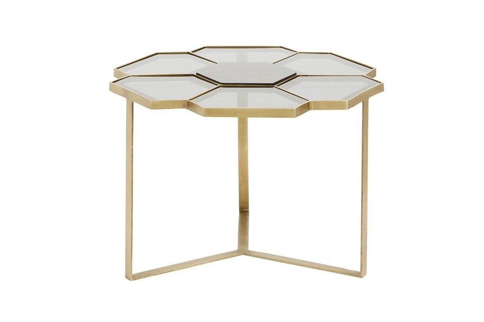 Scoprite la variante oro e nero di questo tavolino di design