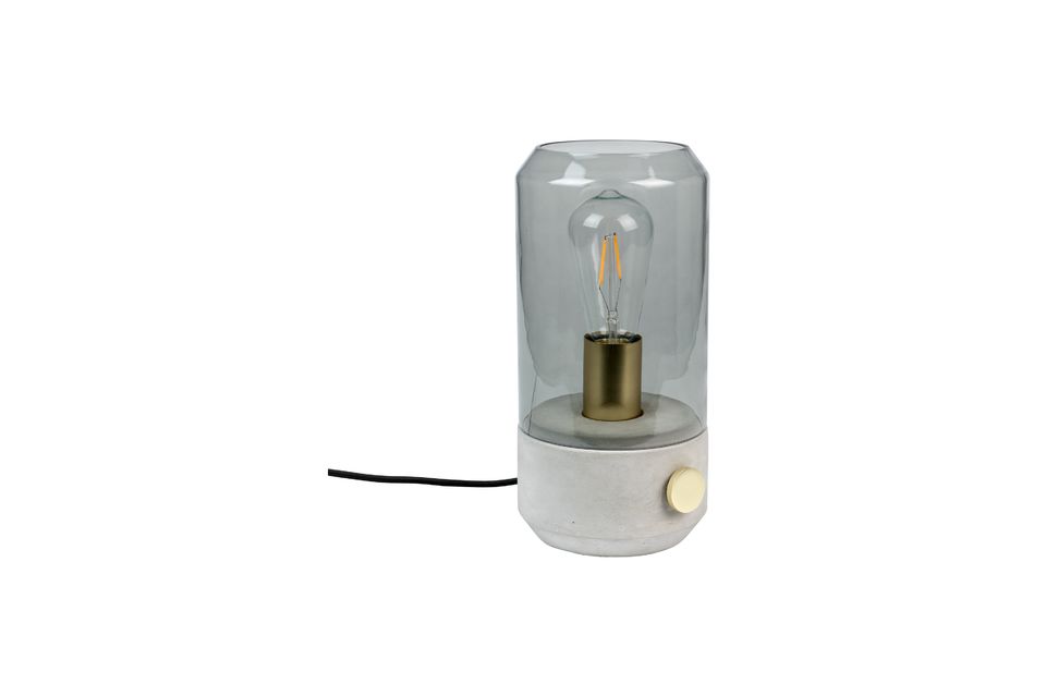 La lampada è racchiusa in una campana di vetro fumé non temperato