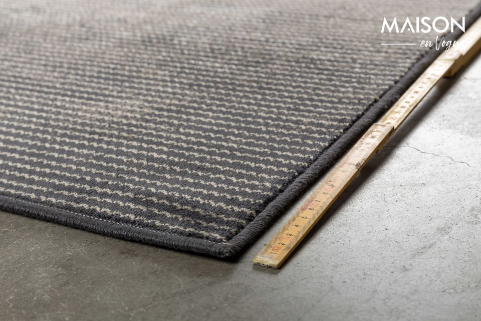 Il tappeto grigio Obi 170 X 240 non rivela tutti i suoi segreti a prima vista