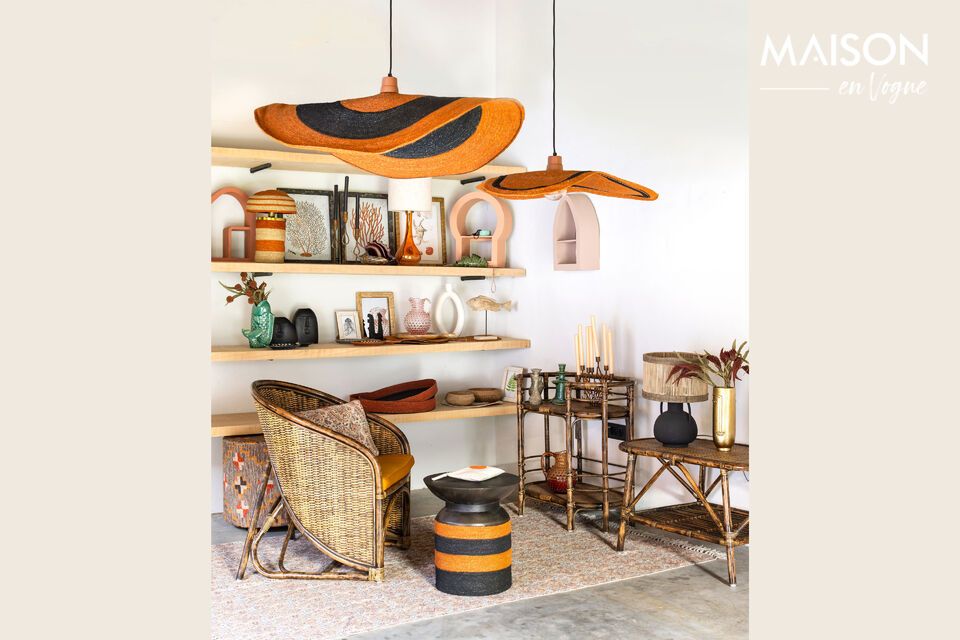 Comfort ed eleganza con la poltrona in rattan.